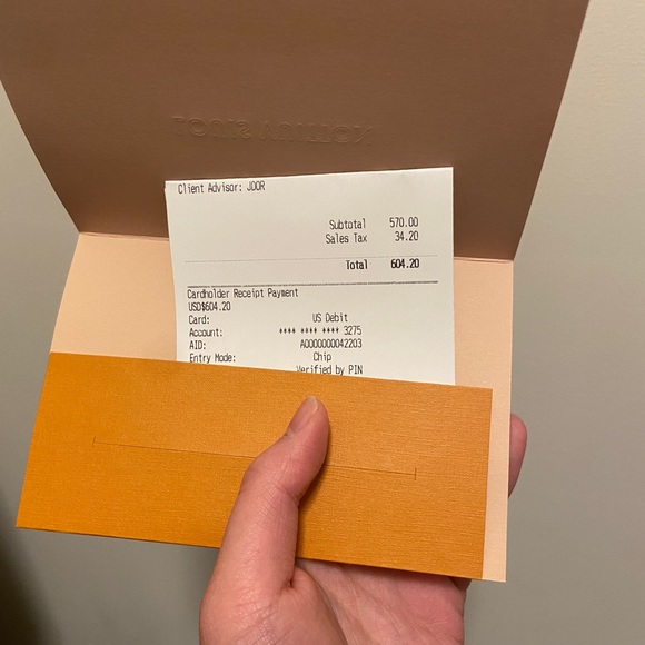 Selling the new LV wallet I just brought for $604 but going for $570